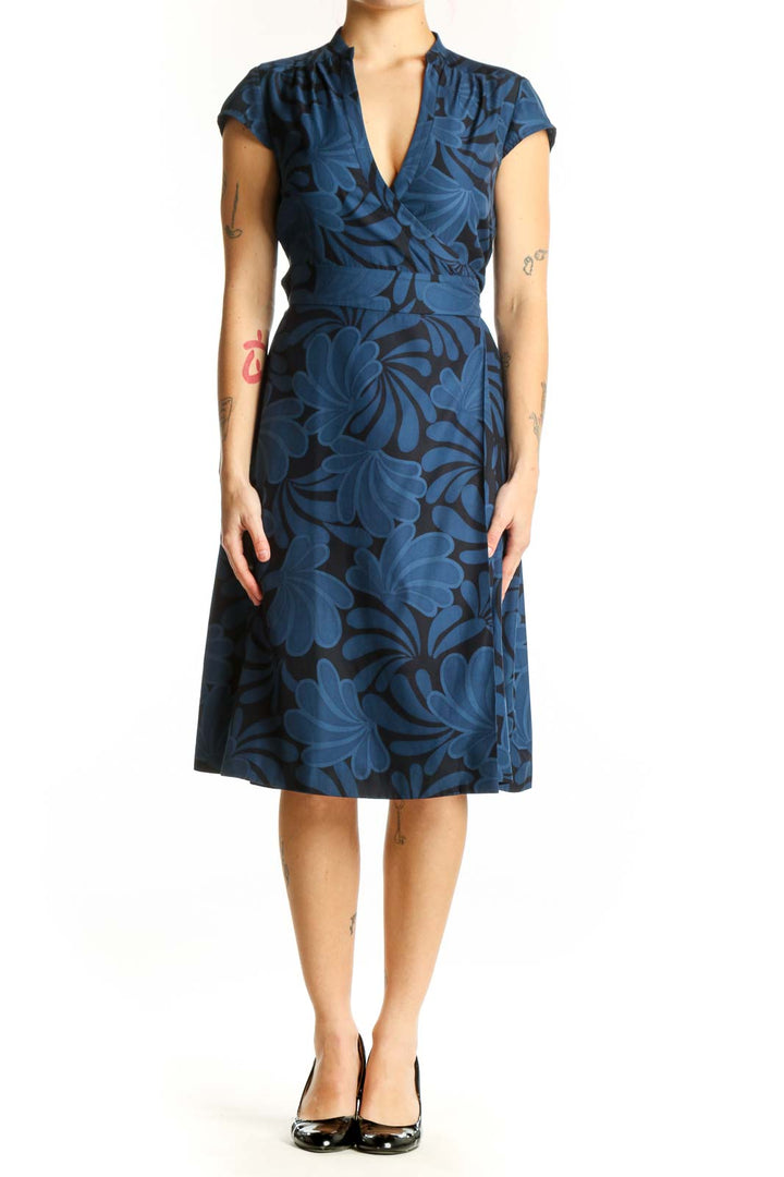 Navy floral wrap midi dress with cap sleeves and wrap-front design, front view