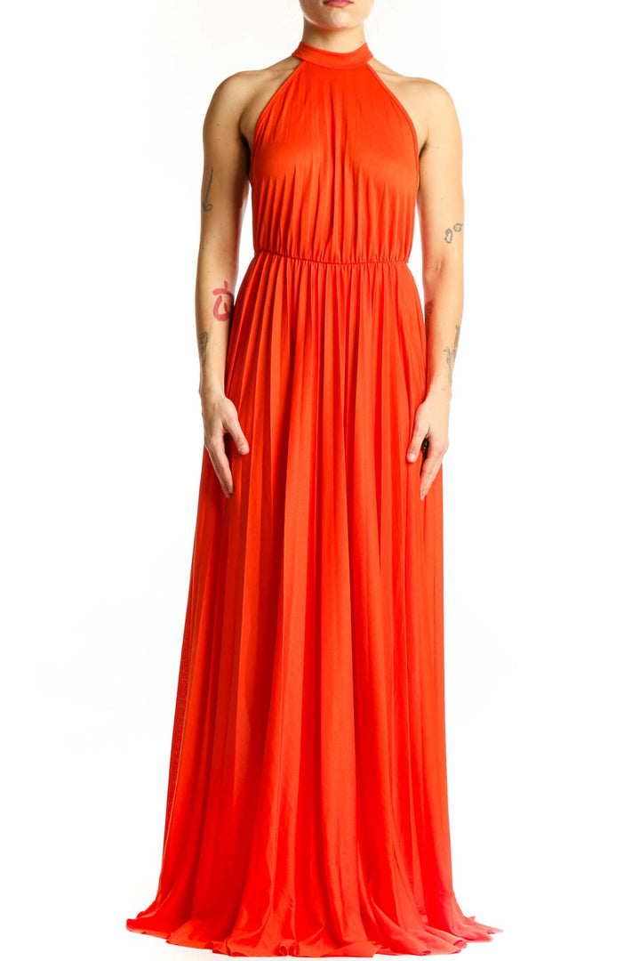 Red halter pleated maxi dress with cinched waist and flowing skirt, front view