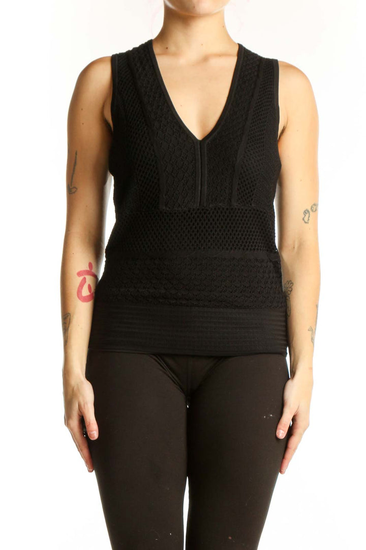 Black textured V-neck sleeveless tank top with front zip detail and fitted waist, front view