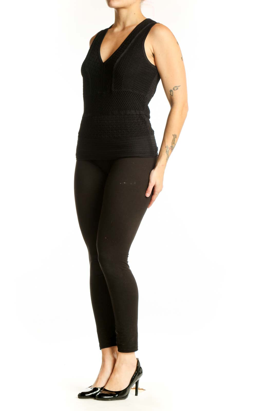 Black textured V-neck sleeveless tank top with front zip detail and fitted waist, front view