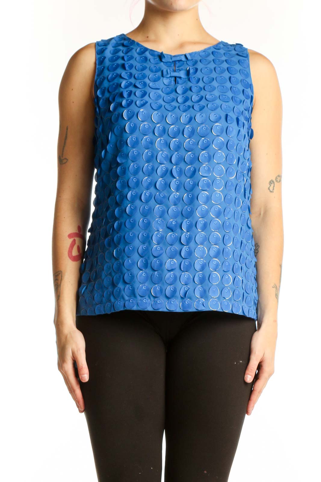 Blue textured sleeveless tank top with dimensional circle pattern, front view