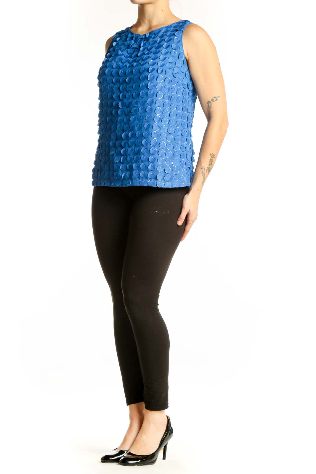 Blue textured sleeveless tank top with dimensional circle pattern, front view
