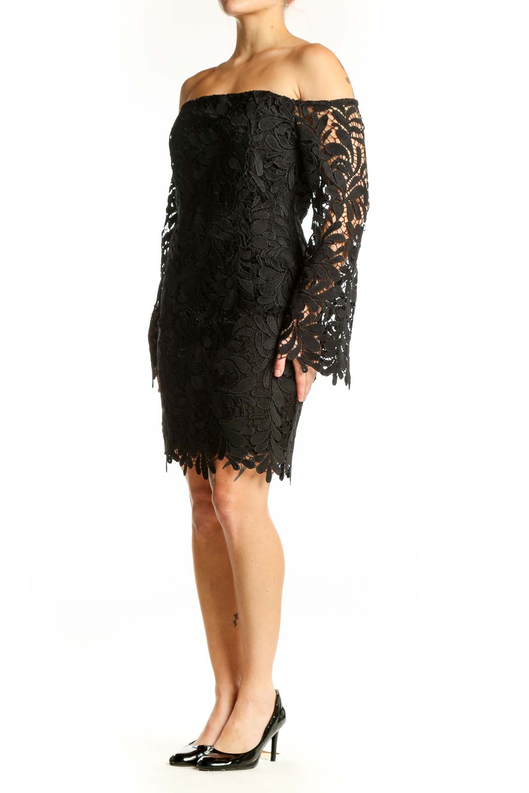 Black lace off-shoulder cocktail dress with floral pattern and sheer long sleeves, front view