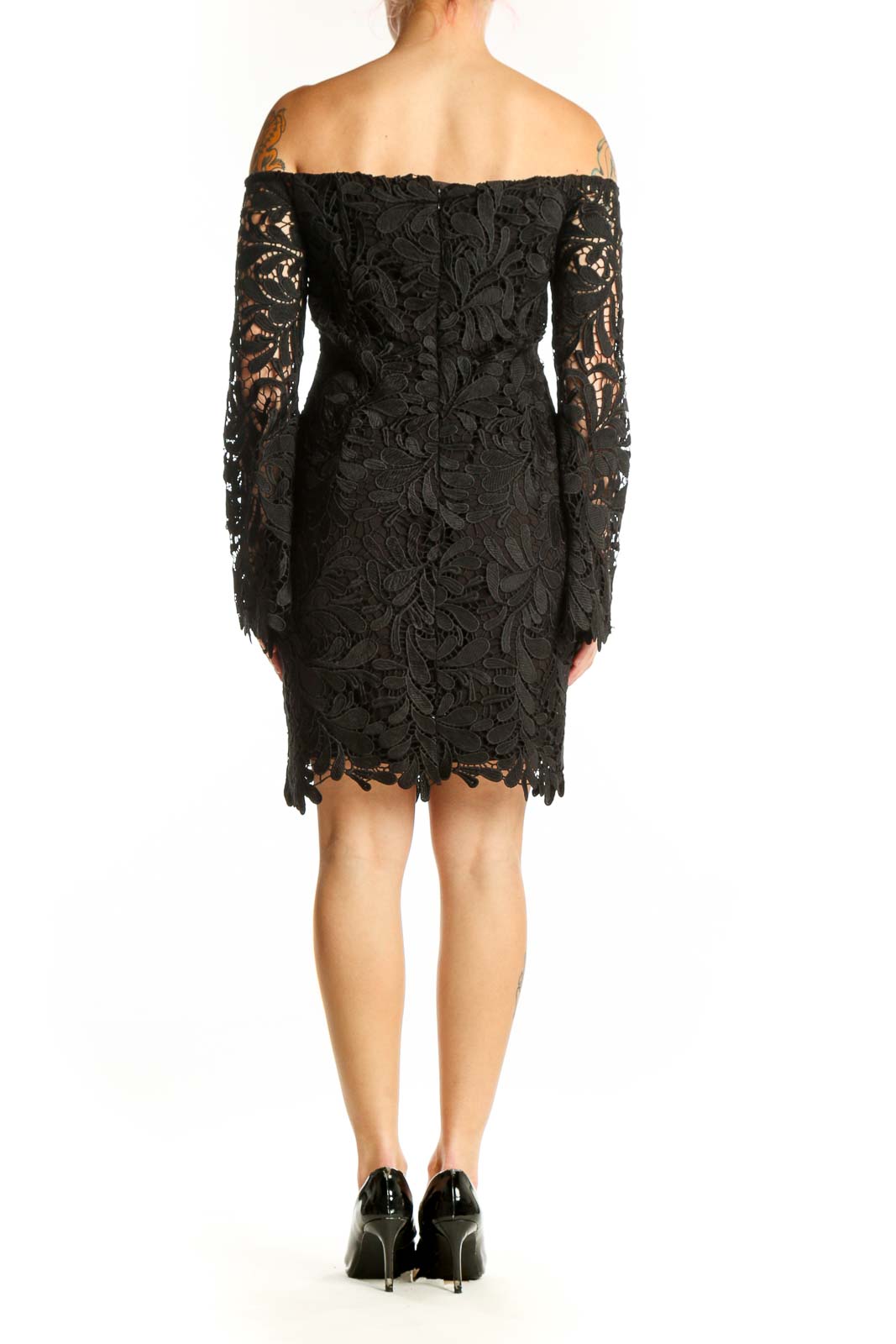 Black lace off-shoulder cocktail dress with scalloped hem and sheer lace sleeves, back view