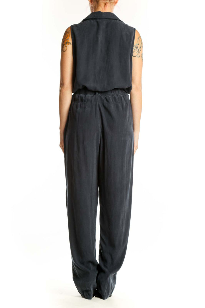 Black sleeveless Tencel jumpsuit with button-front and tie-waist belt, back view