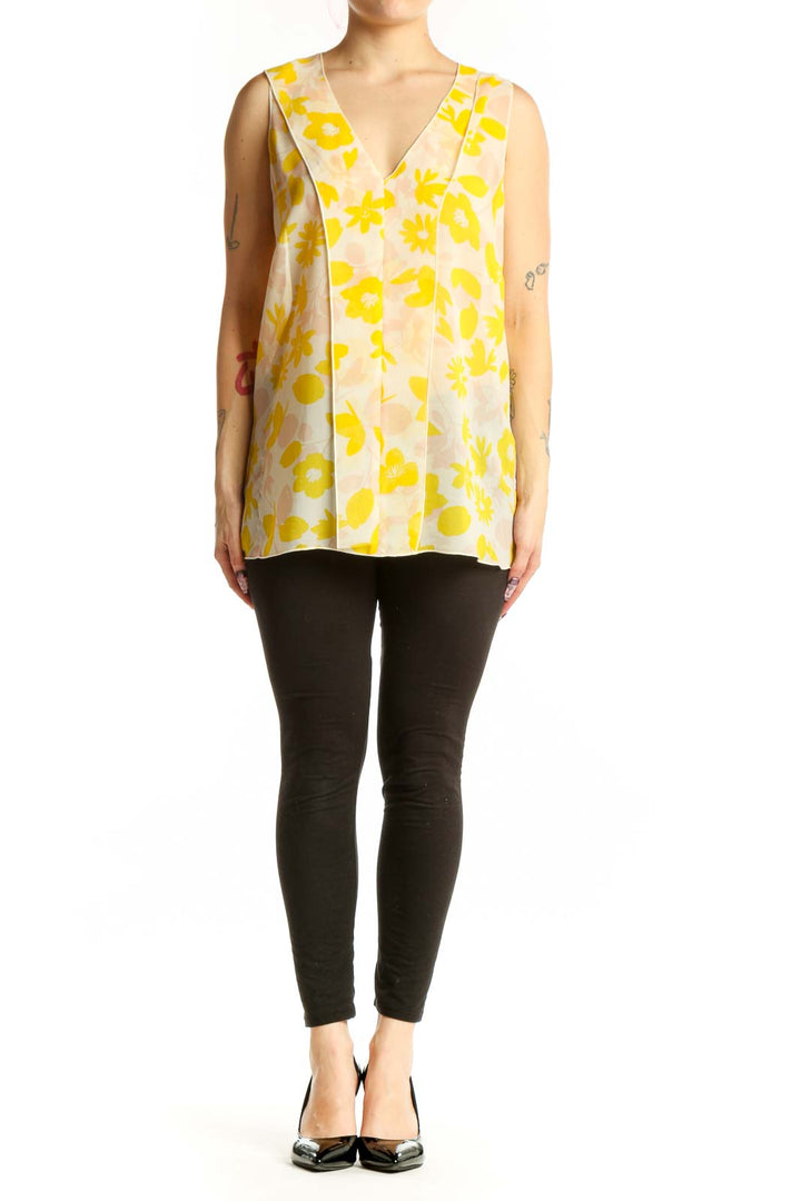 Yellow and cream floral print sleeveless tank top with V-neckline, front view