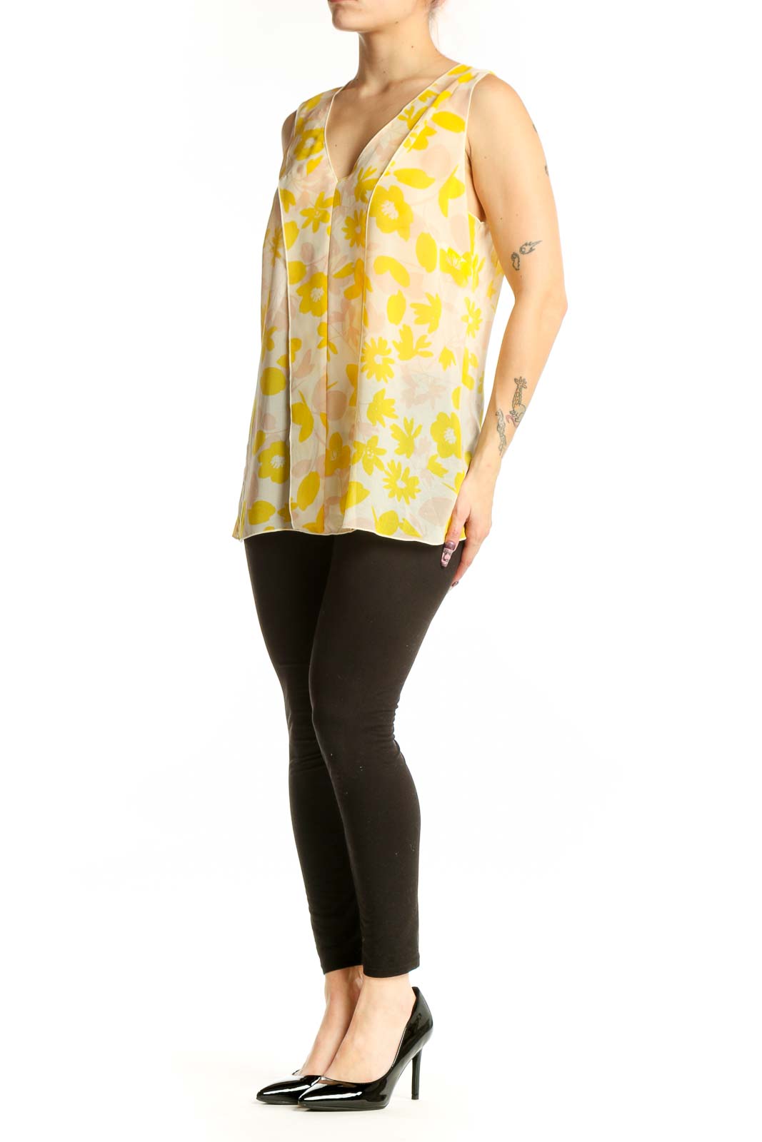 Yellow and cream floral print sleeveless tank top with V-neckline, front view