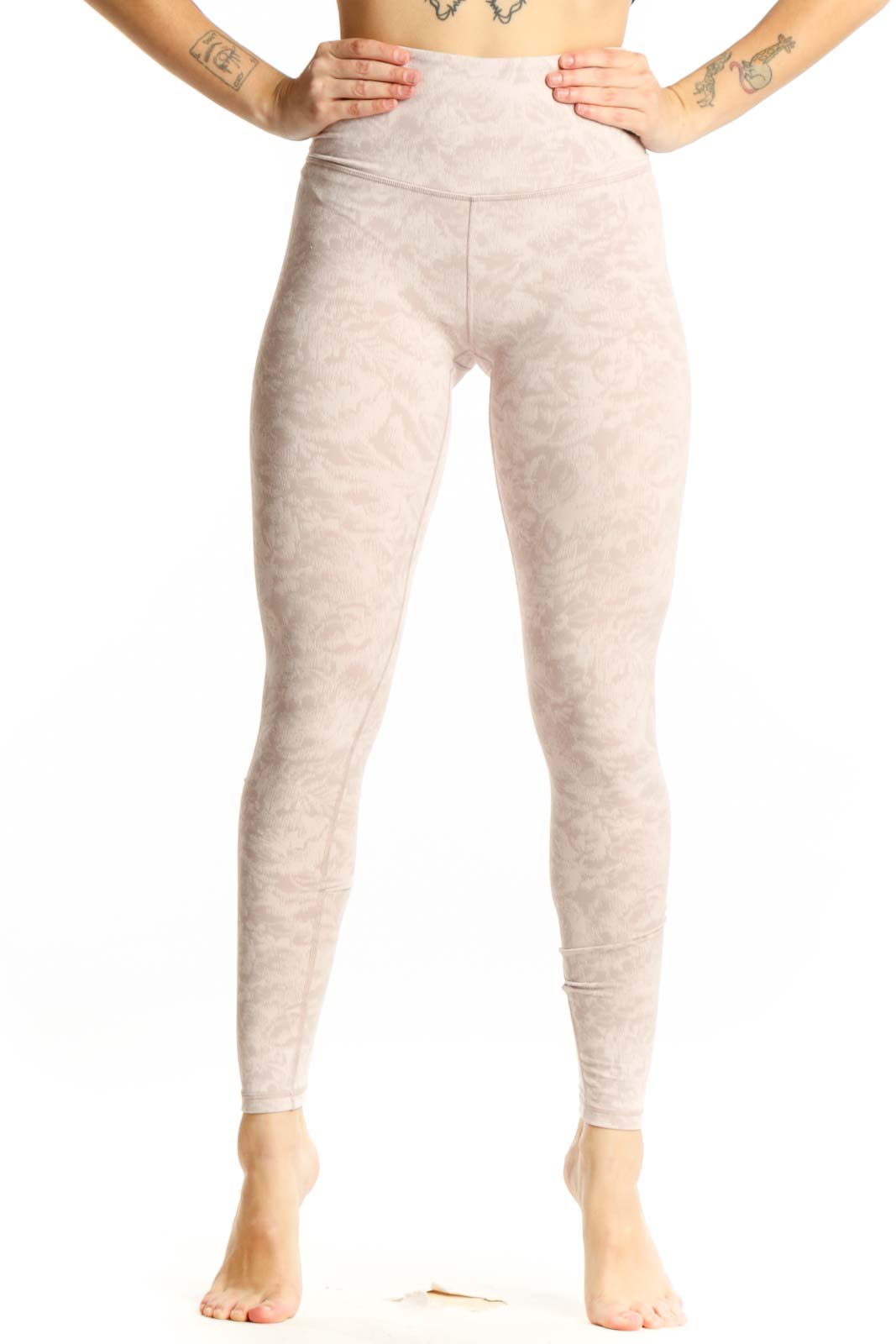 Cream heathered high-waist leggings front view, Athleta XS activewear with nylon-spandex blend