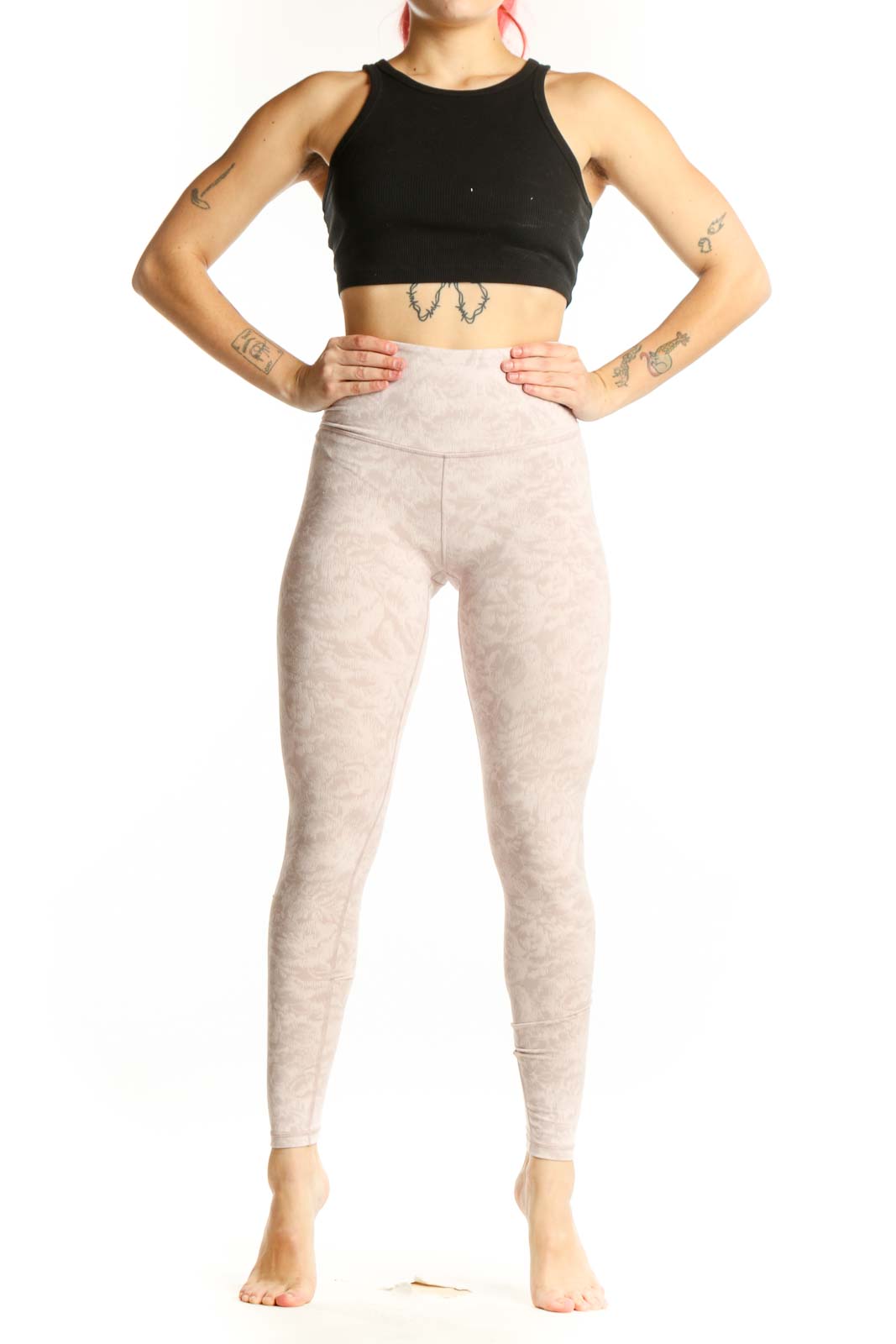 Cream heathered high-waist leggings front view, Athleta XS activewear with nylon-spandex blend