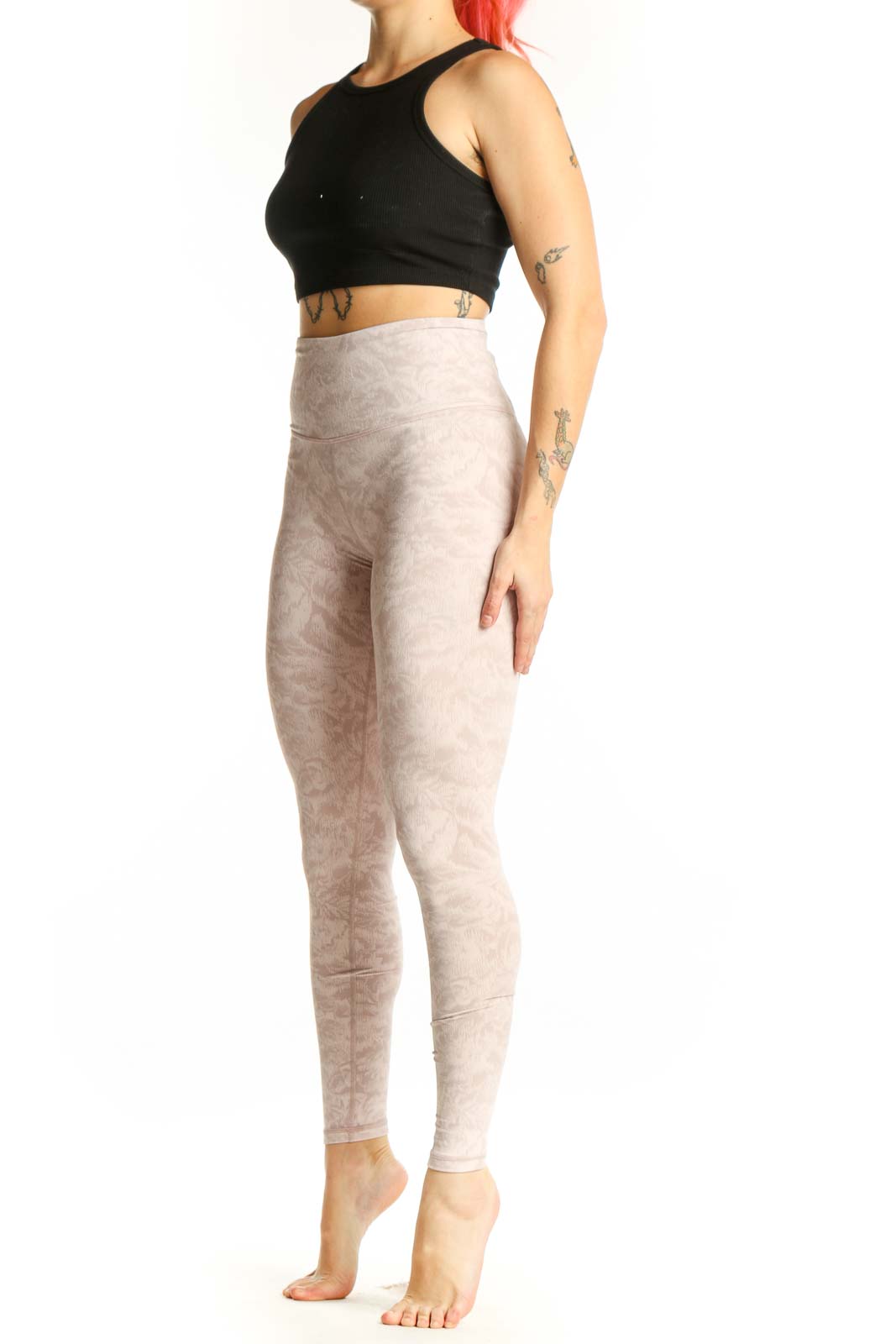 Cream heathered high-waist leggings front view, Athleta XS activewear with nylon-spandex blend