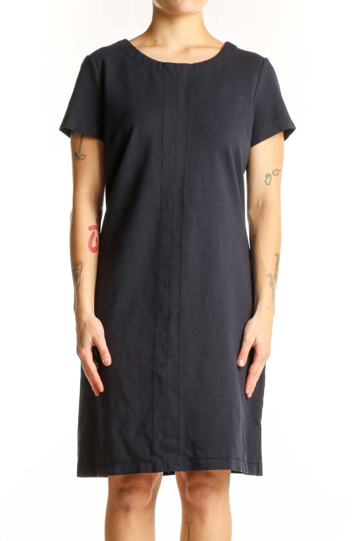 Black short sleeve t-shirt dress with center pleat detail and crew neckline, front view