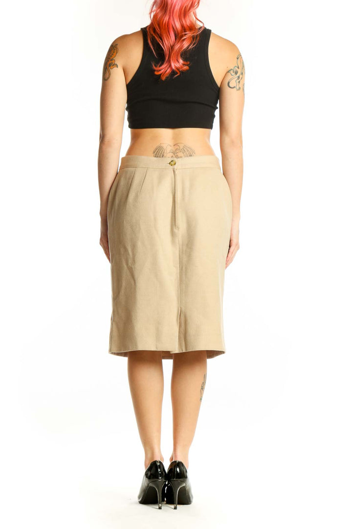 Cream wool pencil skirt by Valentino, back view, displaying tailored fit and premium wool-cashmere blend fabric