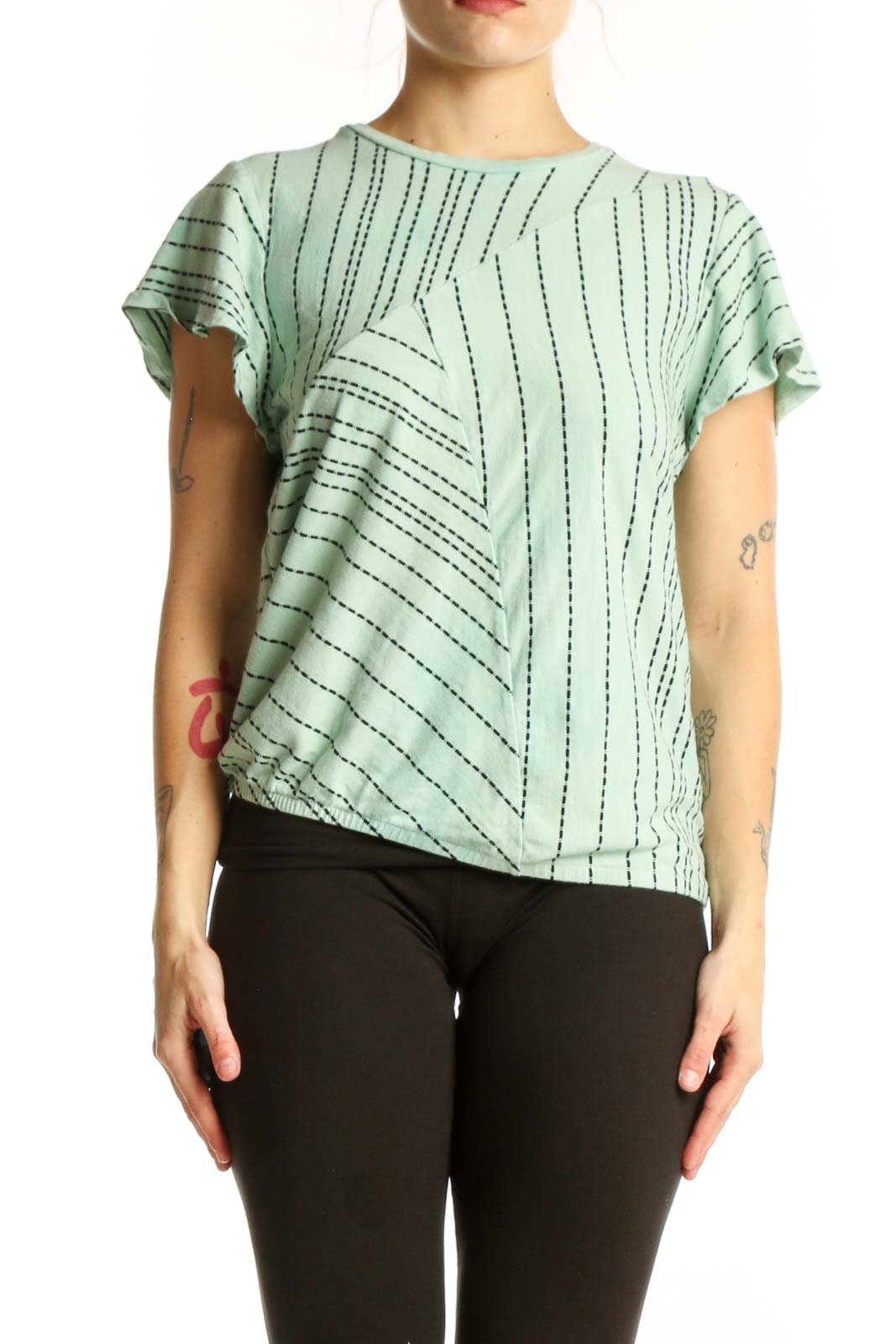 Sage green geometric print short-sleeve top by Dolan, front view showing linear pattern and crew neckline