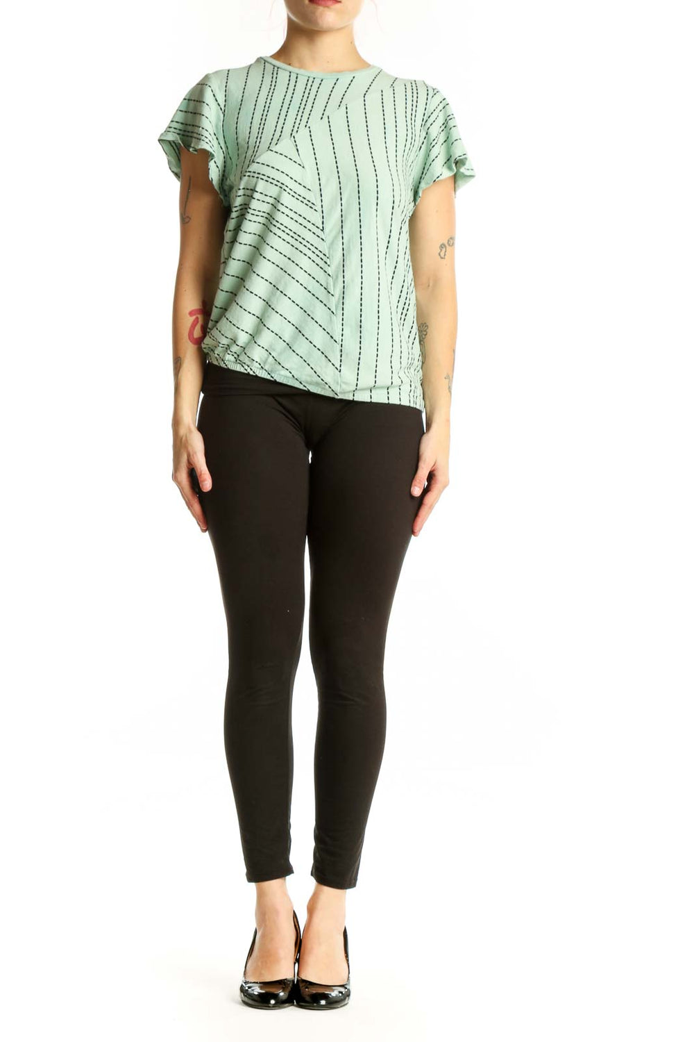 Sage green geometric print short-sleeve top by Dolan, front view showing linear pattern and crew neckline