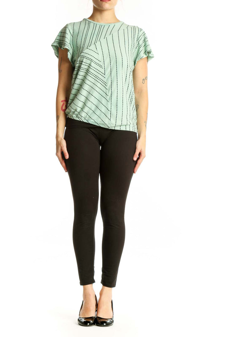 Sage green geometric print short-sleeve top by Dolan, front view showing linear pattern and crew neckline