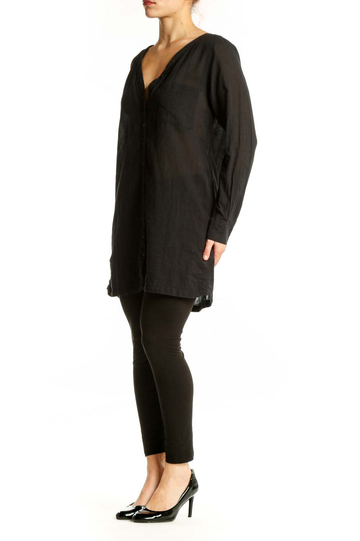 Black cotton button-front shirt dress by Joie with V-neckline and long sleeves, front view
