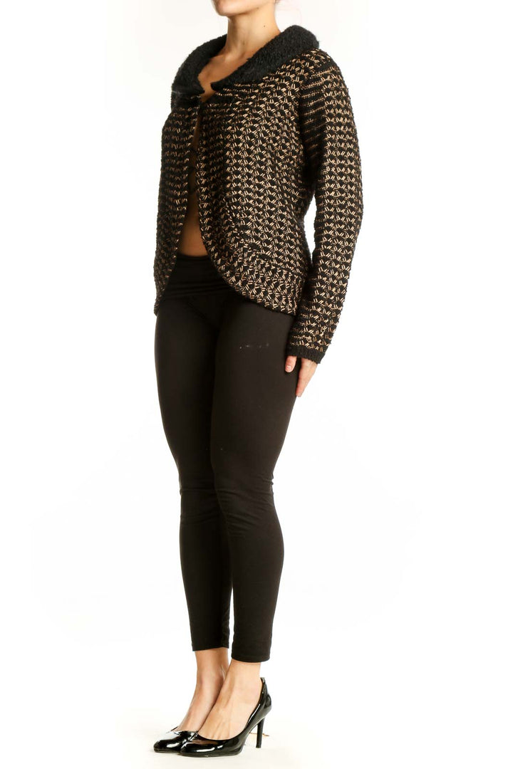 Black and gold metallic knit cardigan with geometric pattern and tie-front detail, front view