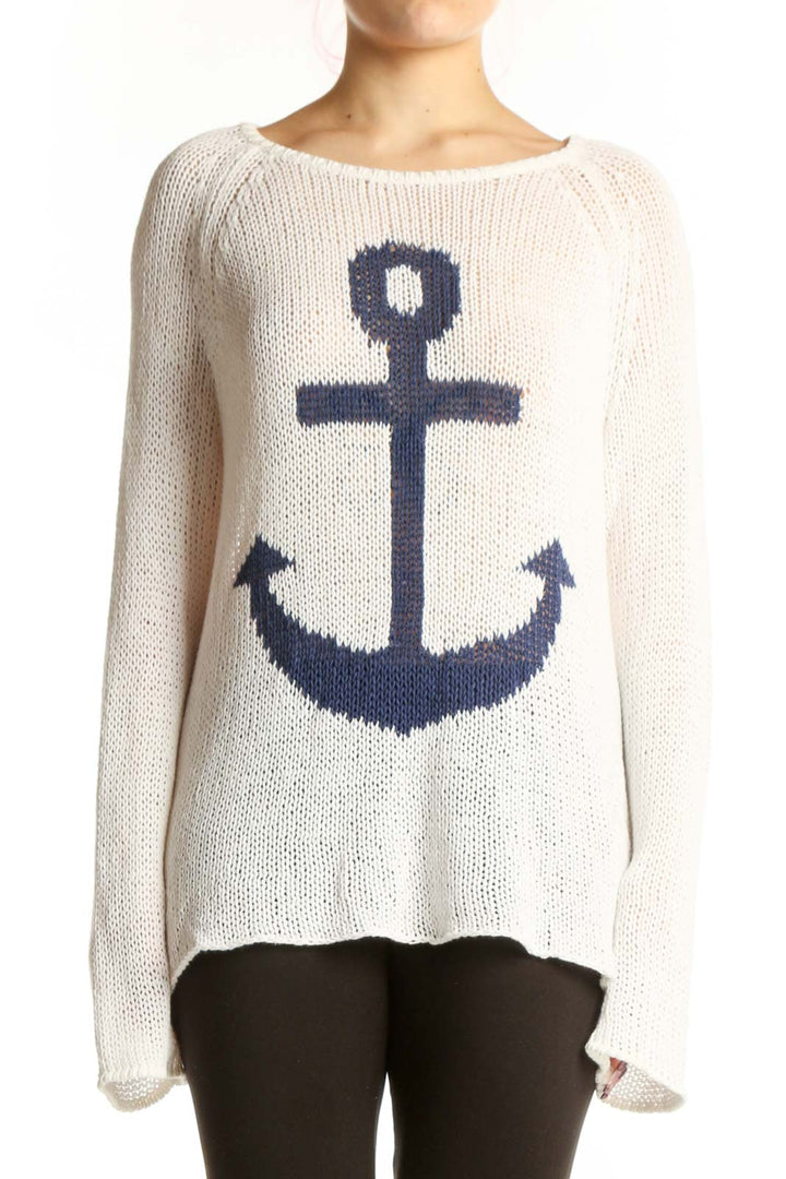 Cream knit pullover sweater with navy anchor design on front, long sleeves, crew neckline