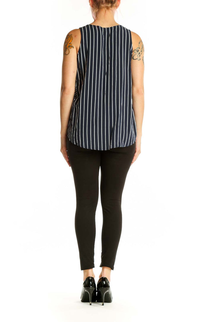 Navy and white striped viscose tank top, back view showing relaxed fit