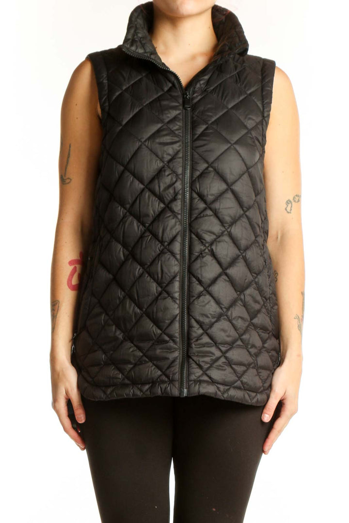 Black quilted puffer vest with diamond quilting pattern and full-length zip closure, front view