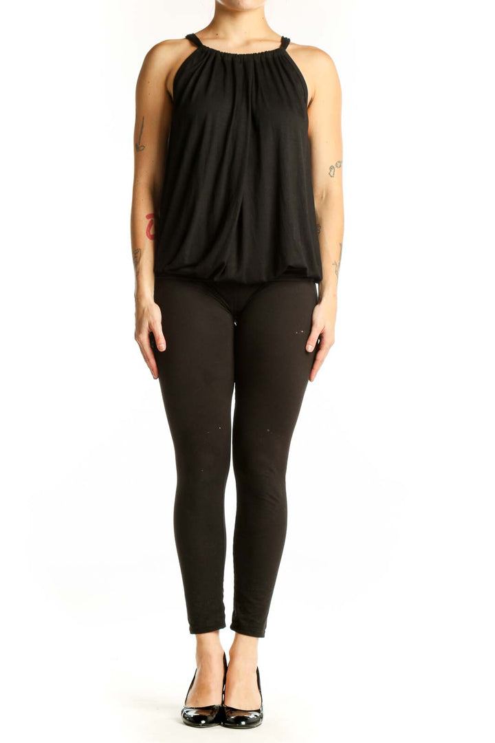 Black halter bubble top with gathered neckline and sleeveless design, front view