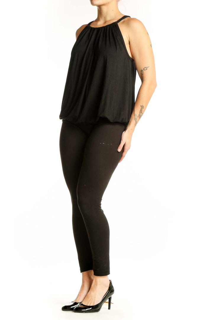 Black halter bubble top with gathered neckline and sleeveless design, front view
