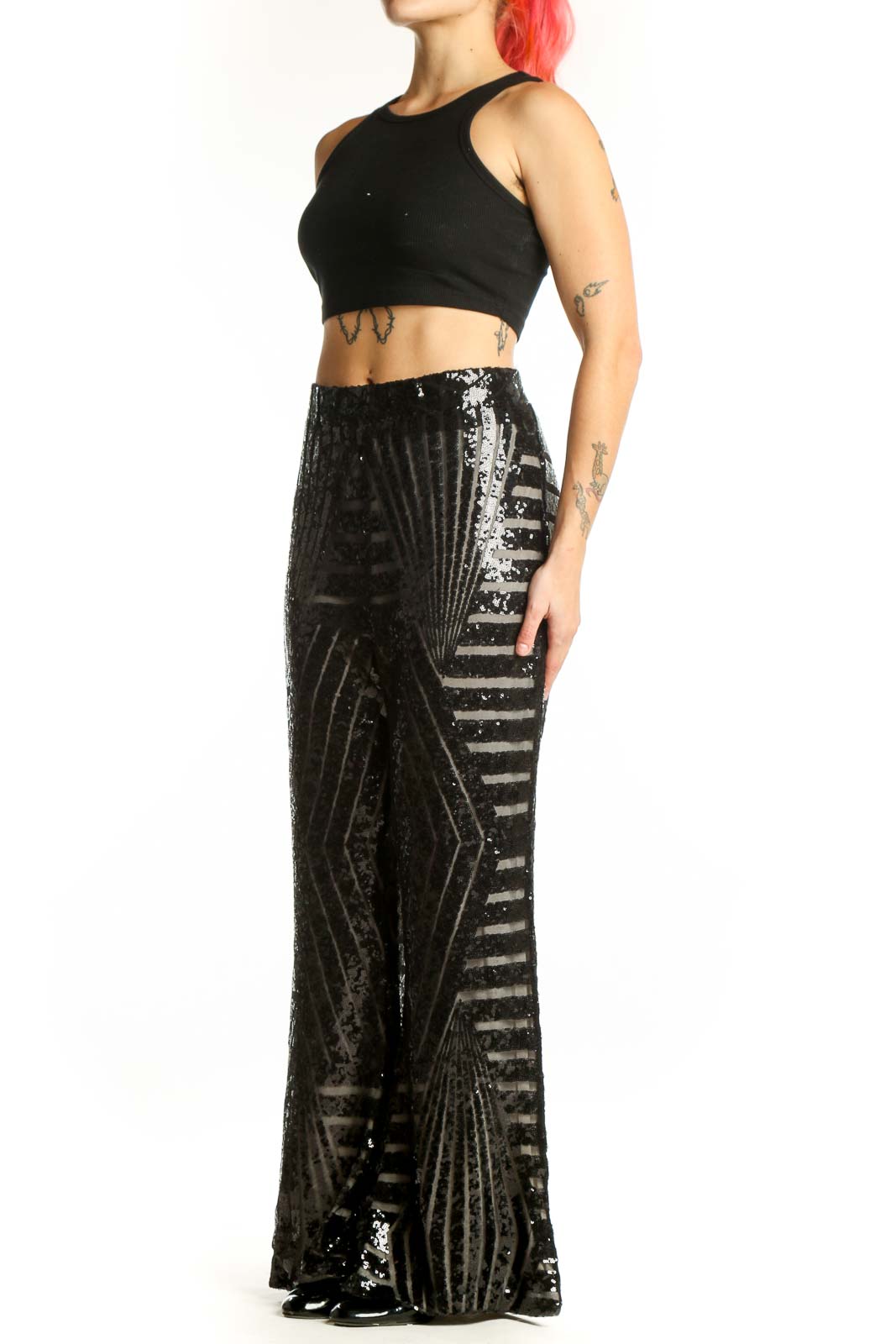 Black sequin striped wide leg pants with geometric pattern, front view