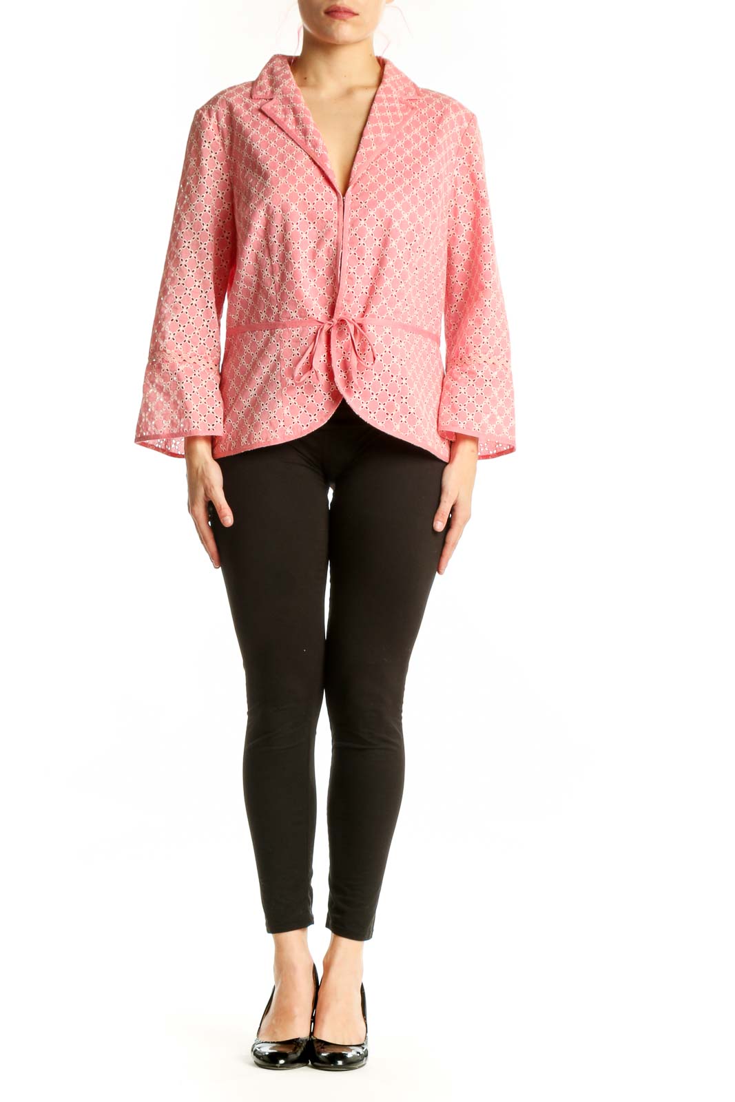 Pink geometric cotton blazer with white pattern and wrap-front tie closure, worn on model