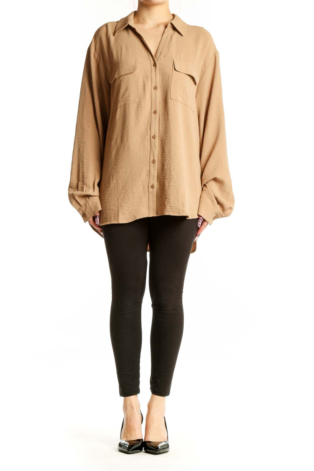 Beige Pleione button-up shirt with chest pockets and collared neckline, front view on model