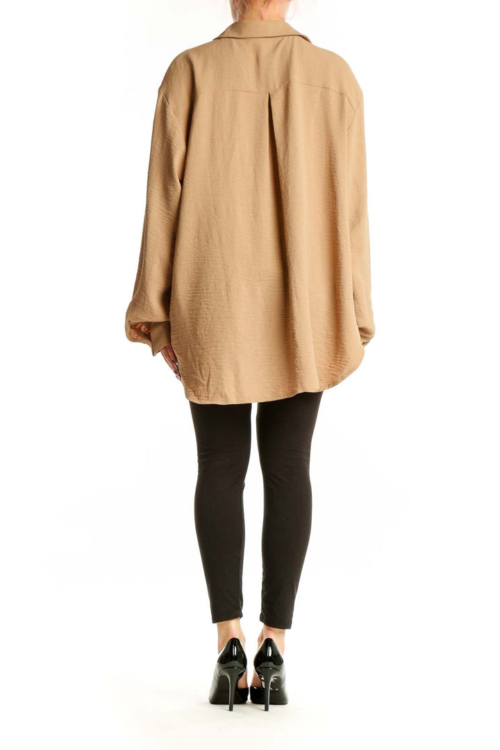 Beige Pleione button-up shirt back view showing relaxed fit and voluminous sleeves