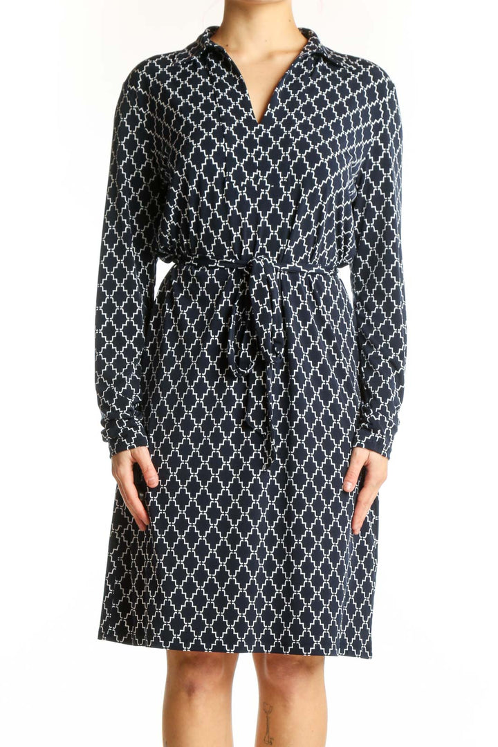 Navy geometric quatrefoil print shirt dress with button-front and belted waist, front view