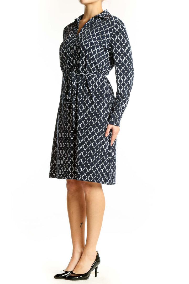 Navy geometric quatrefoil print shirt dress with button-front and belted waist, front view