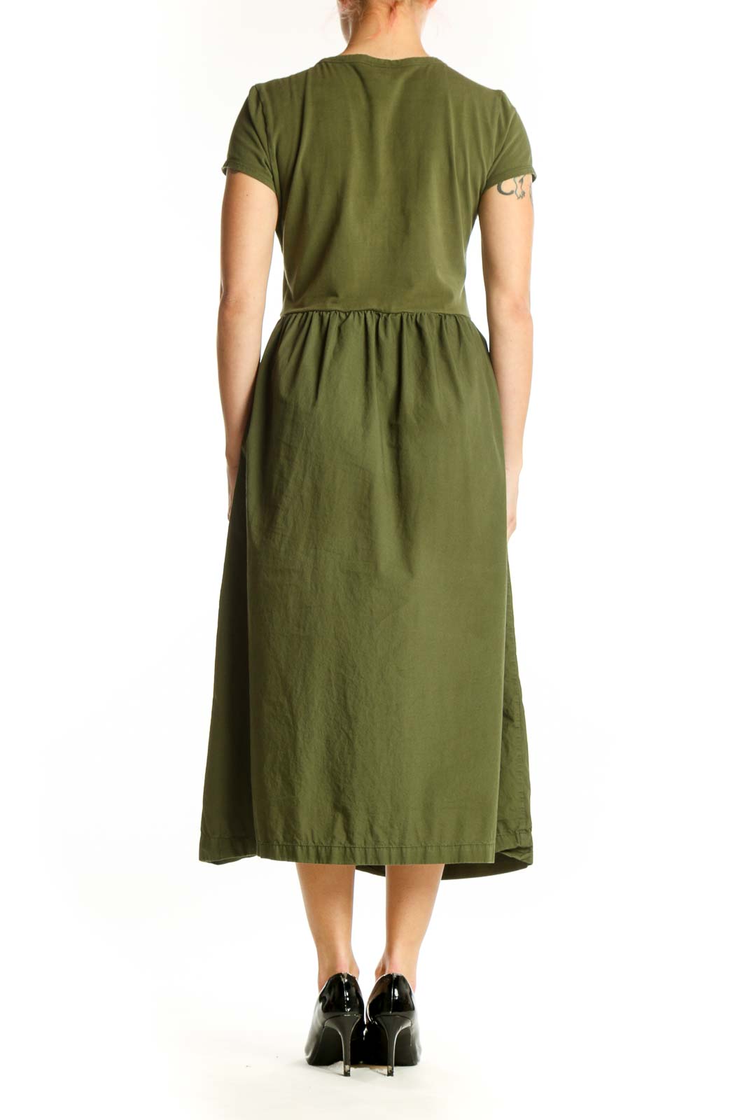 Back view of olive green cotton midi dress showing flowing A-line skirt