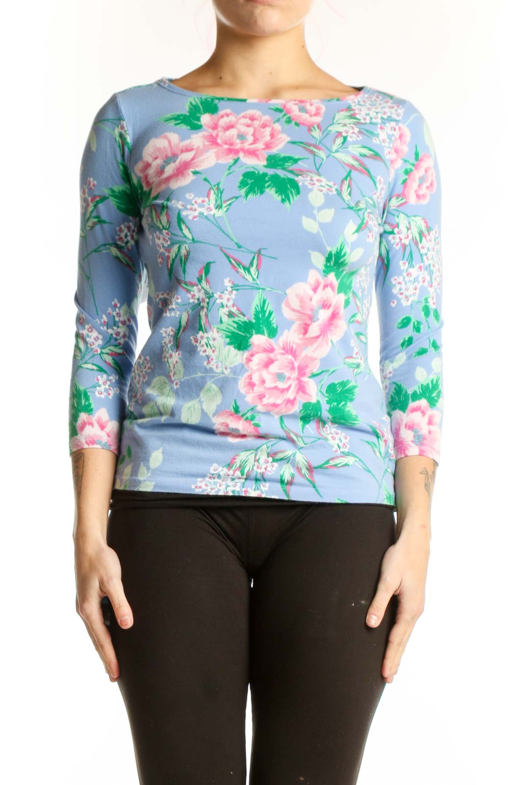 Blue floral Talbots top with pink peonies and green foliage, three-quarter sleeves, front view on model
