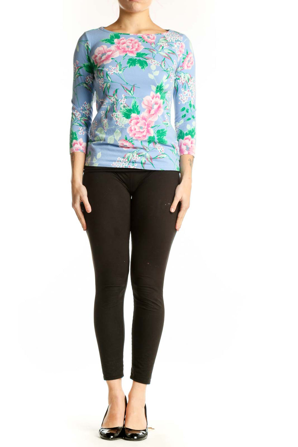 Blue floral Talbots top with pink peonies and green foliage, three-quarter sleeves, front view on model