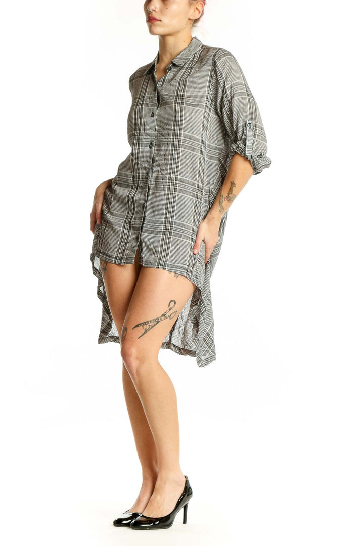 Gray plaid button-up shirt dress with high-low hemline and rolled sleeves, front view