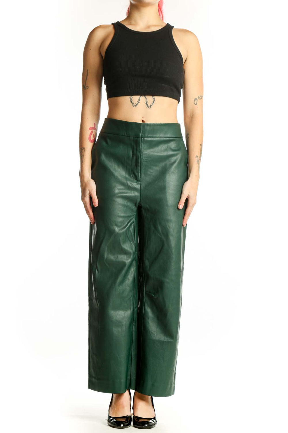 Front view of green leather wide leg pants with high waisted design and flowing silhouette