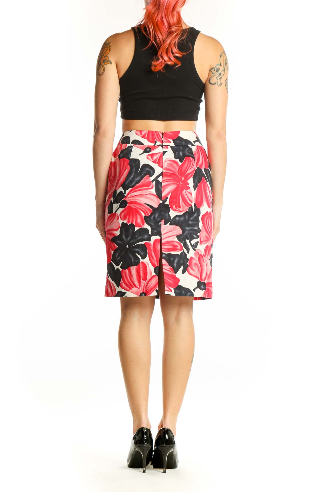 Red and black floral print pencil skirt back view, showing sleek pencil silhouette and knee-length hem