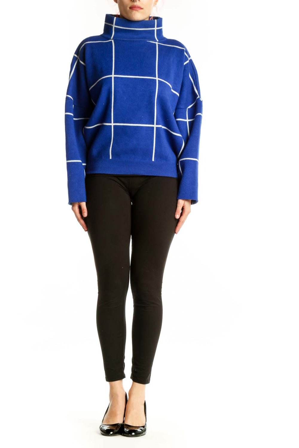 Blue grid turtleneck knit sweater with white geometric pattern, front view