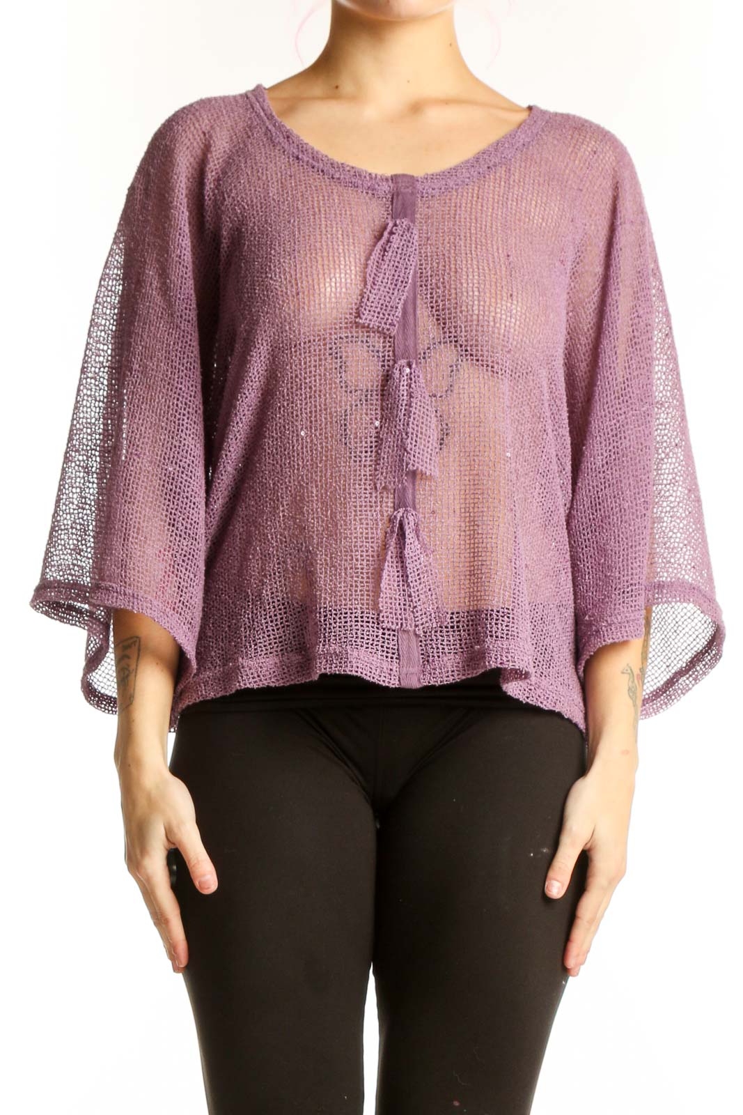 Purple knit poncho top with tassel detail and three-quarter sleeves, front view