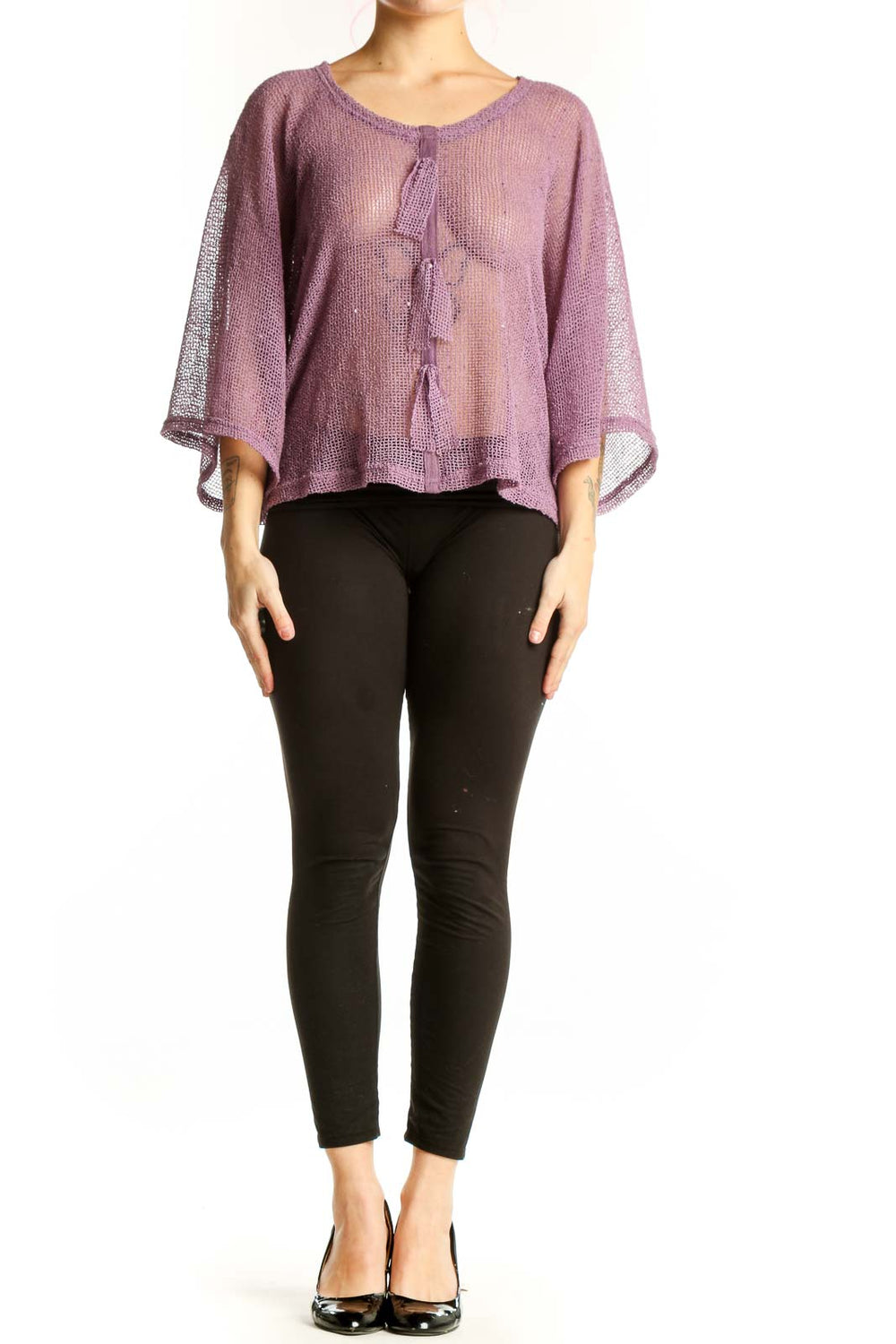 Purple knit poncho top with tassel detail and three-quarter sleeves, front view