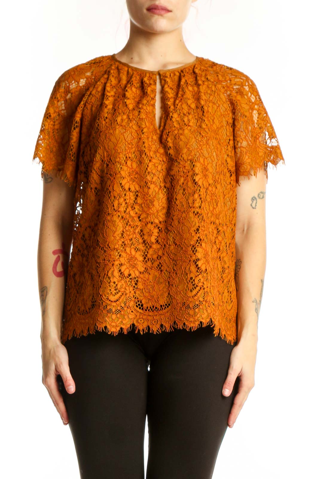 Orange lace short sleeve top with keyhole neckline and scalloped lace edges, front view