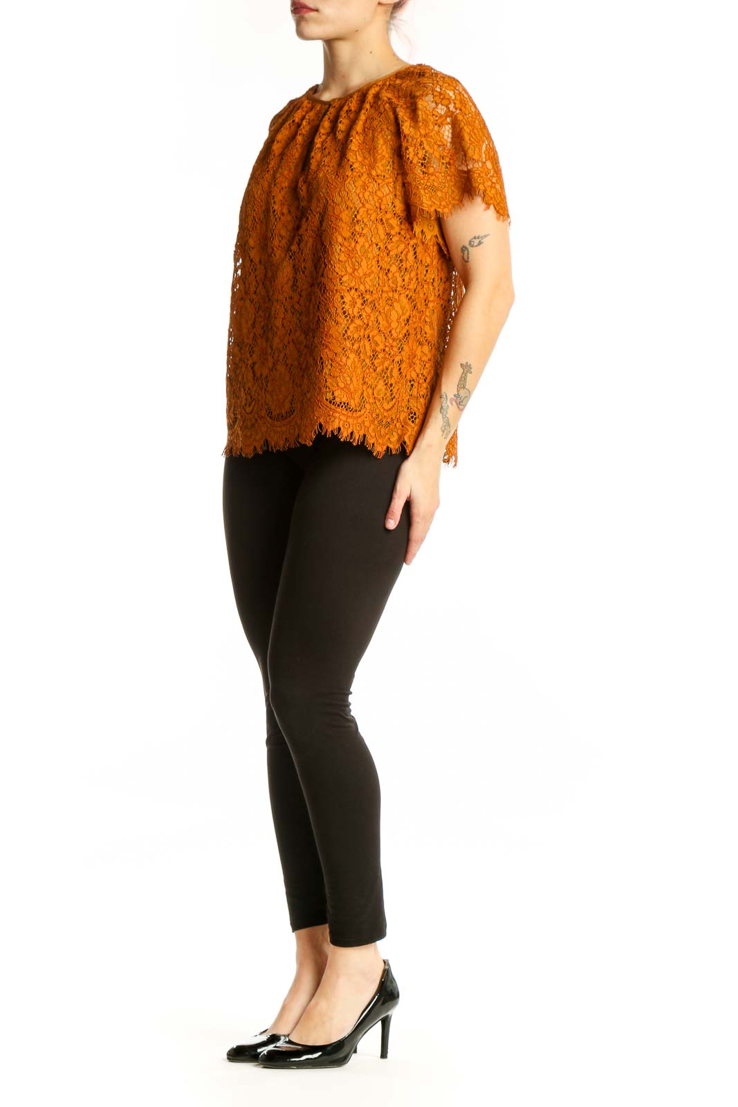 Orange lace short sleeve top with keyhole neckline and scalloped lace edges, front view