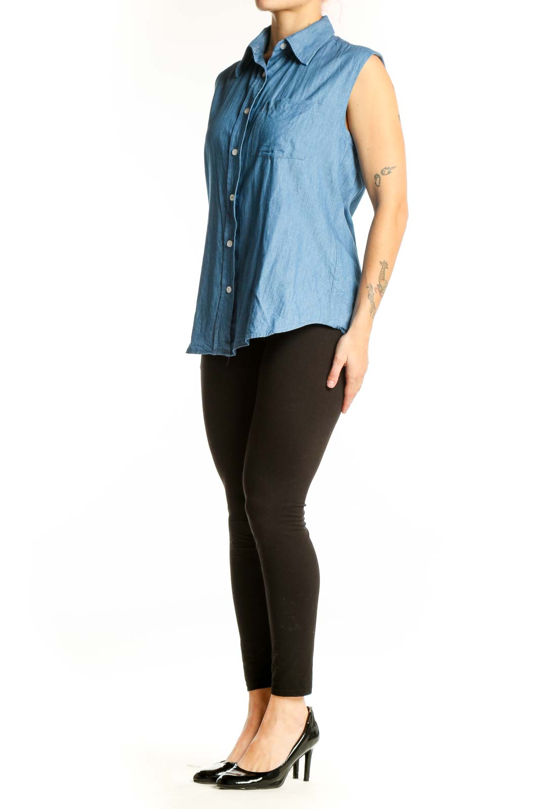 Blue denim sleeveless button-up shirt with collar and chest pocket, front view