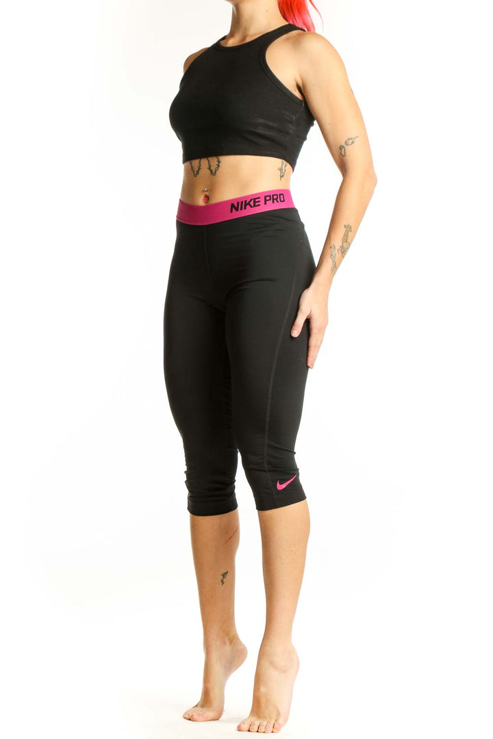 Nike Black Capri Leggings with Pink Waistband - Front View