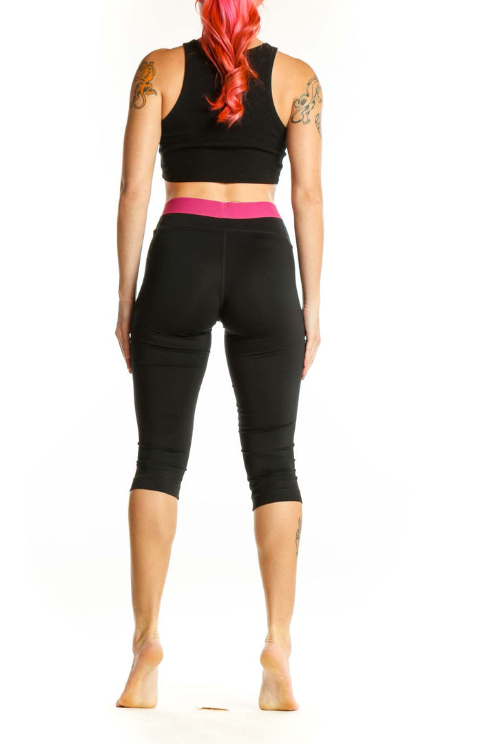 Nike Black Capri Leggings with Pink Waistband and Nike Branding - Back View