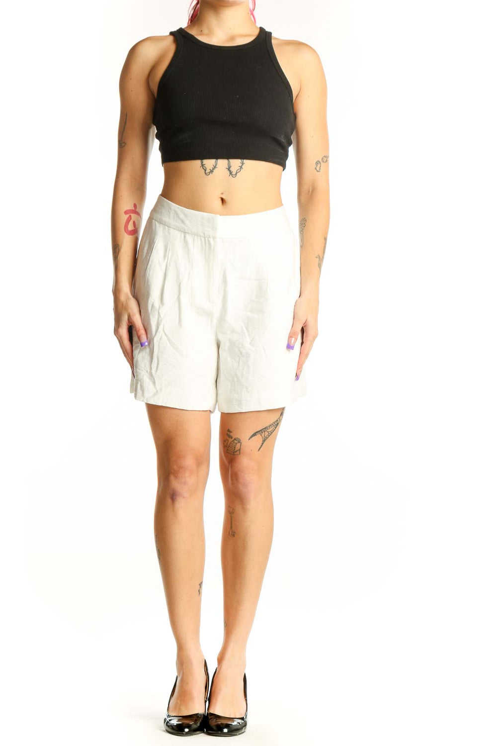 Cream pleated high-waist shorts by Vince Camuto, front view showing tailored fit and pleated design