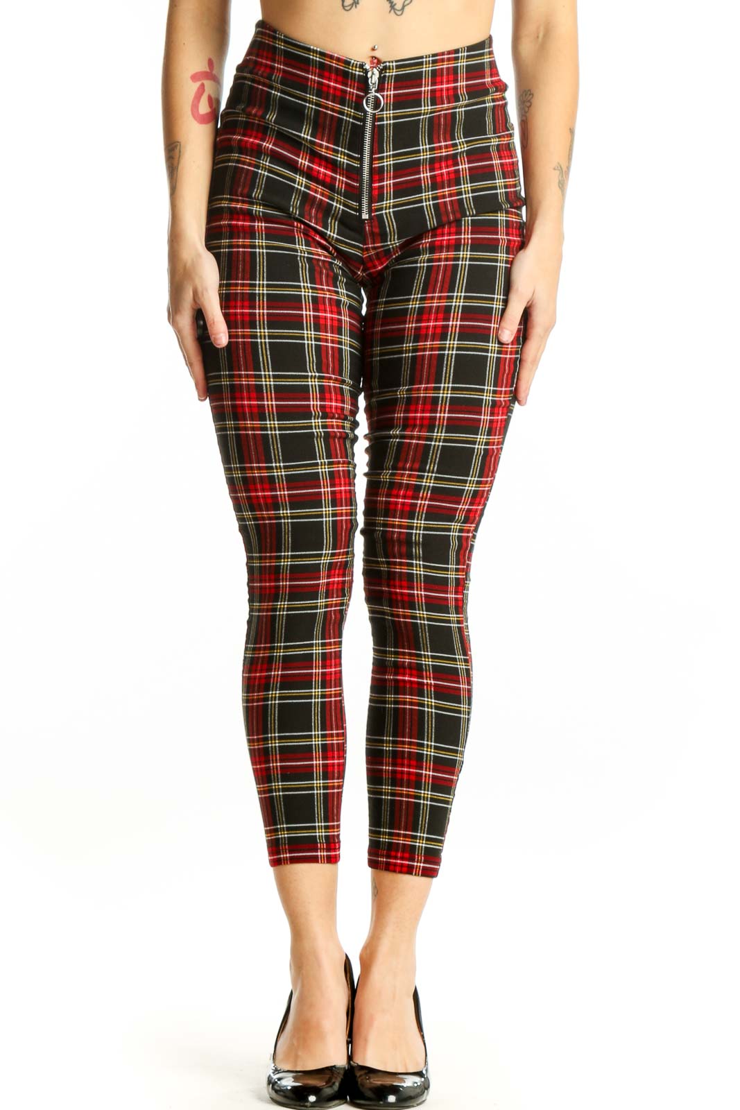 Red tartan plaid cropped pants with high-waisted design and zip fly closure, front view