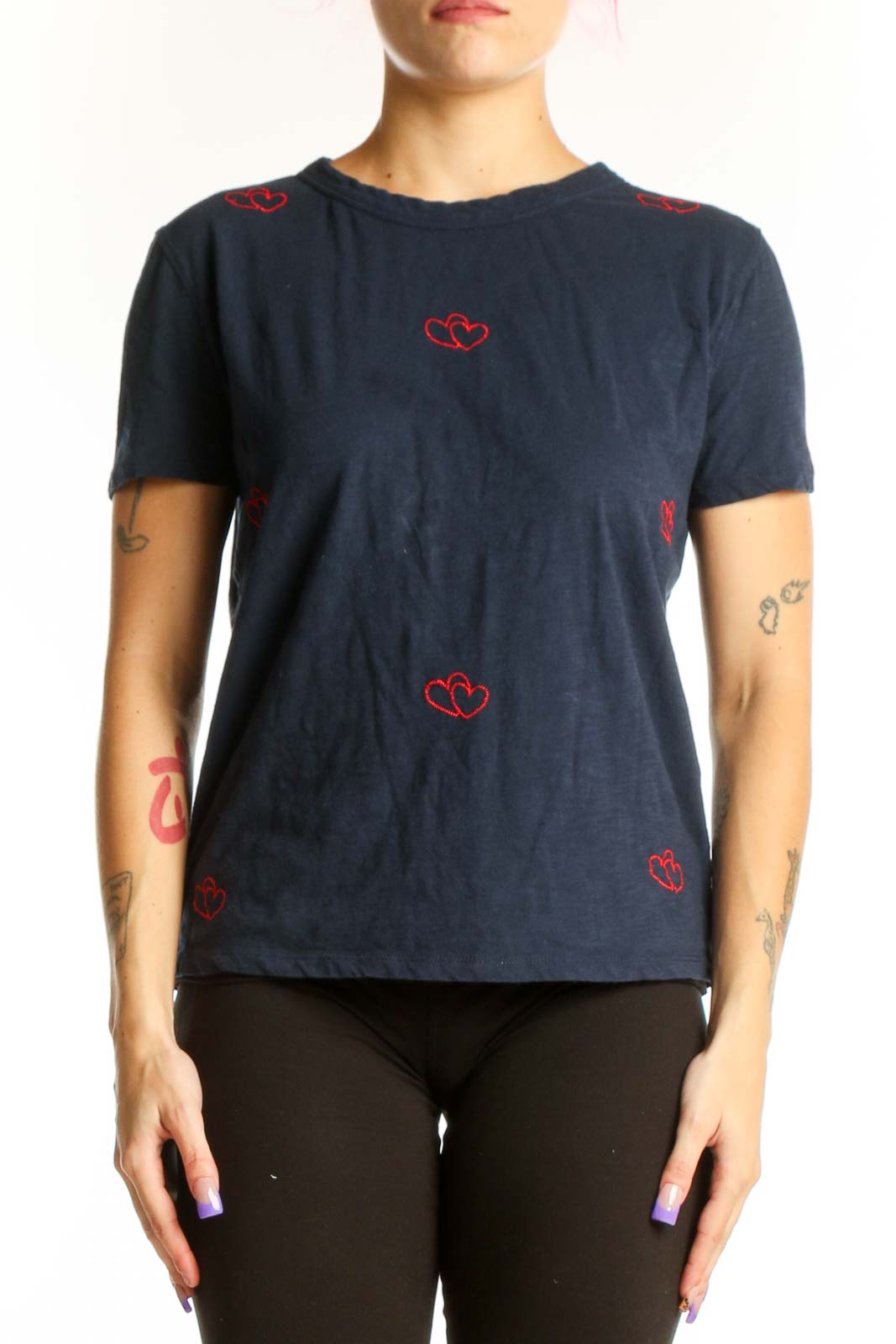 Navy cotton t-shirt with red heart embroidery design, front view on model