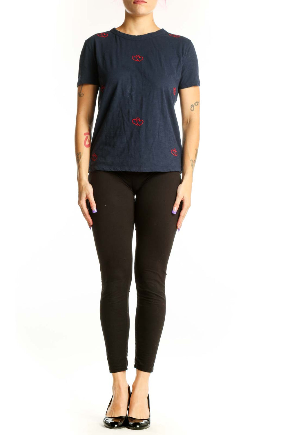 Navy cotton t-shirt with red heart embroidery design, front view on model